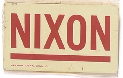 Nixon Metal and Plastic Badge
